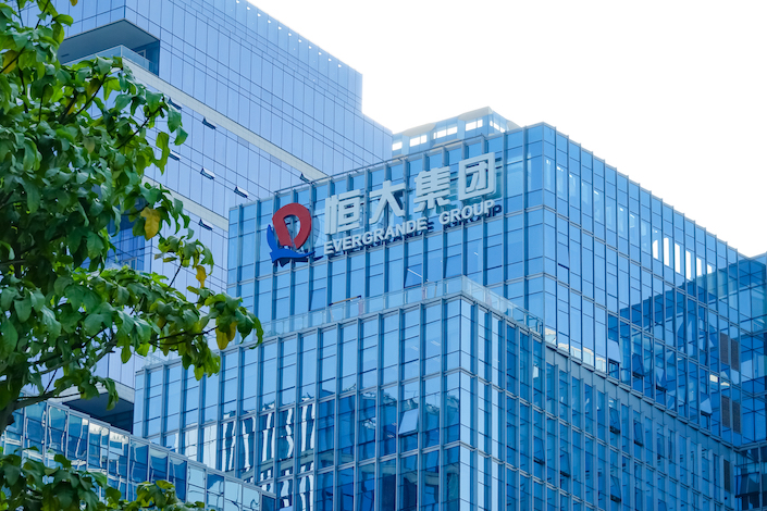 Evergrande is grappling with more than $300 billion in liabilities and undergoing a debt restructuring.
