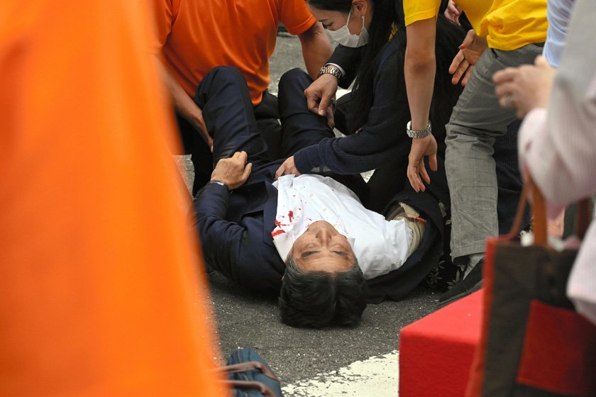 Former Japanese Prime Minister Shinzo Abe lies on the ground after he was shot while giving a speech Friday in the western city of Nara, Japan. Photo: VCG