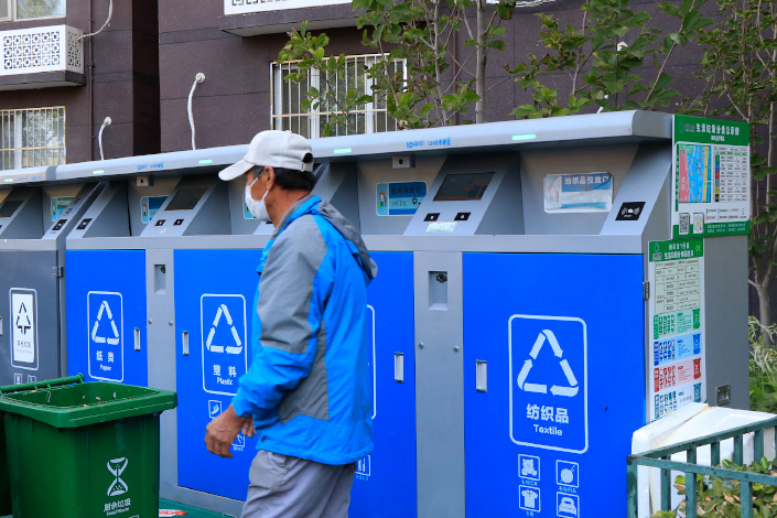 Garbage bins equipped with face recognition technology are installed in a Beijing neighborhood in 2020. The lids of the bins opens only when residents are identified. Photo: VCG