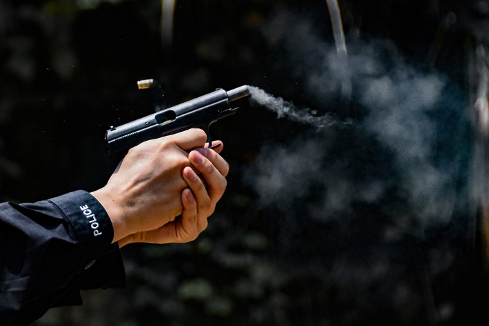 A Sichuan province armed officer is suspected of shooting at least two people before going on the run. Photo: VCG