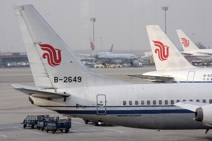 In its first half earnings estimate, Air China said it expects to report a net loss of between 18.5 billion yuan and 21 billion yuan.
