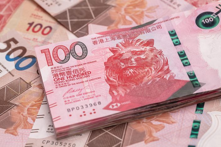 Hong Kong five-hundred and one-hundred dollar banknotes are arranged for a photograph in Hong Kong, China