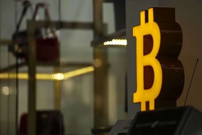 The Bitcoin logo in a shopping center in Tbilisi, Georgia, on July 25. Photo: Bloomberg