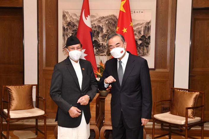 Wang Yi, China’s foreign minister, meets Wednesday with his visiting Nepali counterpart, Narayan Khadka, in Qingdao, Shandong province. Photo: China’s Ministry of Foreign Affairs