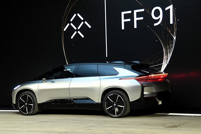 Faraday Future's FF 91 prototype electric crossover vehicle is unveiled during a press event for CES 2017 at The Pavilions at Las Vegas Market on January 3, 2017 in Las Vegas. Photo: VCG
