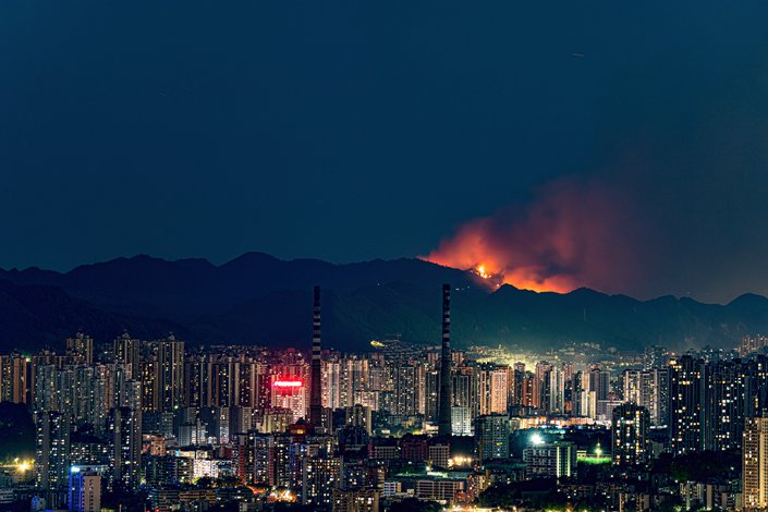 A wildfire blazes in Chongqing's Banan district on Aug. 21. Photo: VCG