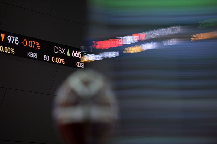 An electronic ticker board displays stock prices inside the Indonesia Stock Exchange in Jakarta in January 2016. Photo: Bloomberg