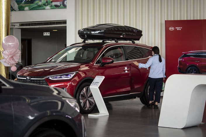 Record output and sales shielded the carmaker from Covid disruptions and supply-chain pain. Photo: Bloomberg