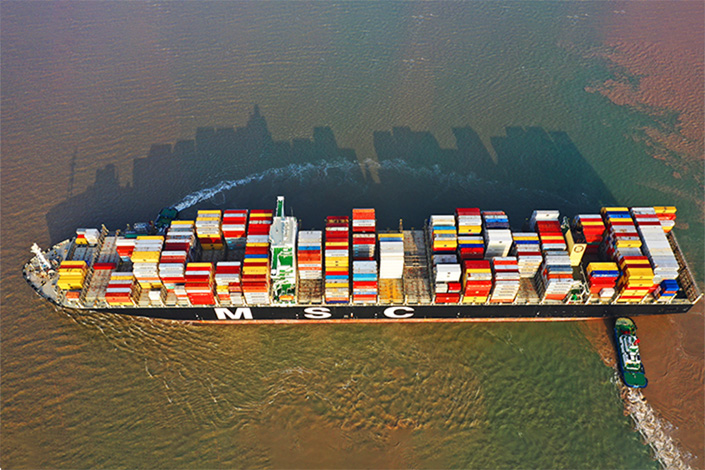 A cargo ship carrying containers leaves the Yangshan Port in Shanghai in 2019. Photo: VCG
