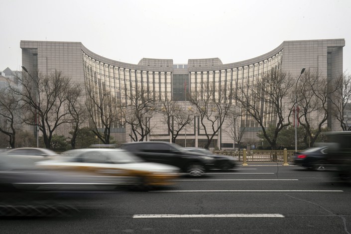 China’s attempts to cap the yuan’s weakness are spurring bets it may hold off large monetary easing steps in the near term. Photo: Bloomberg