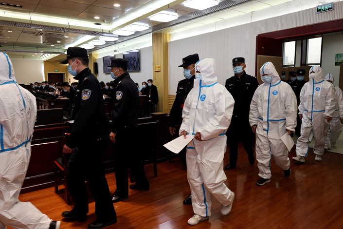 Defendants who've been out on bail attend court in Zaozhuang, Shandong province, on Nov. 20, 2021. Photo: VCG