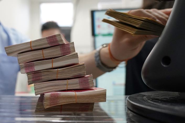 Bundles of Chinese yuan banknotes at the Ninja Money Exchange, operated by Interbank HD, in the Shinjuku district of Tokyo, Japan, on June 9. Photo: Bloomberg