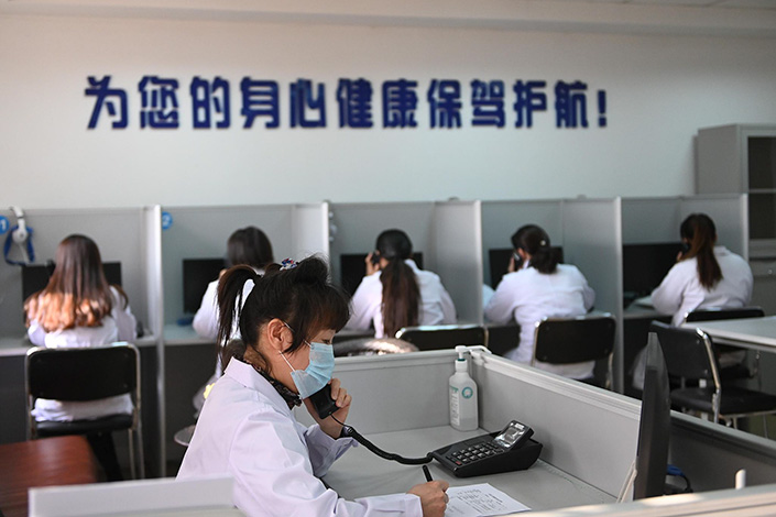 Workers answer the psychological health hotline in Shenyang, Northeast China's Liaoning province, in 2020. A hospital set up the 24-hour hotline to help people who have mental health problems, especially caused by the pandemic. Photo: Yu Haiyang/China News Agency/VCG