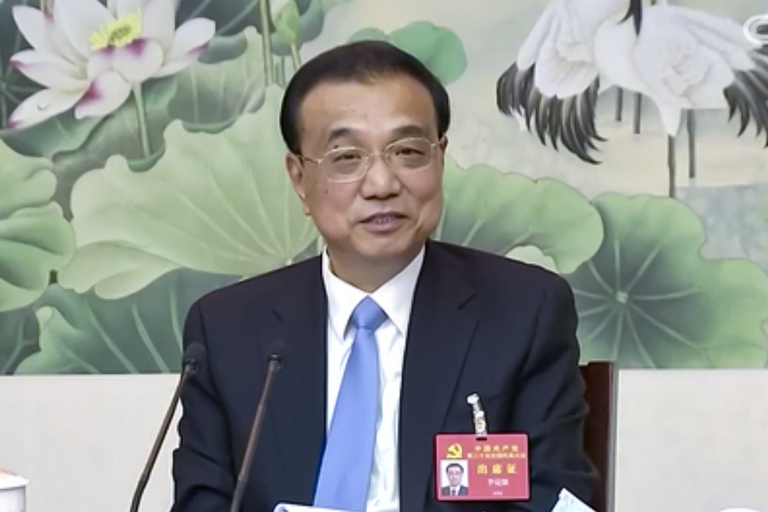 China’s economy is improving, Premier Li Keqiang said Monday, as he called on officials to better implement policies intended to keep the recovery going. Photo: CCTV