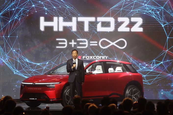 Terry Gou, founder of Foxconn Technology Group, unveils the Model B crossover vehicle at an event in Taipei, Taiwan, on Oct. 18, 2022.