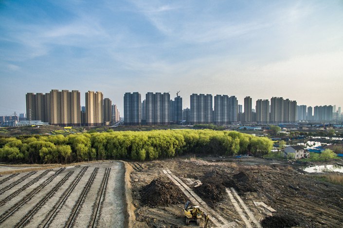 State firms bought 33% of the land on offer in a recent auction in Wuxi, down from as much as 92% in recent sales. Photo: VCG