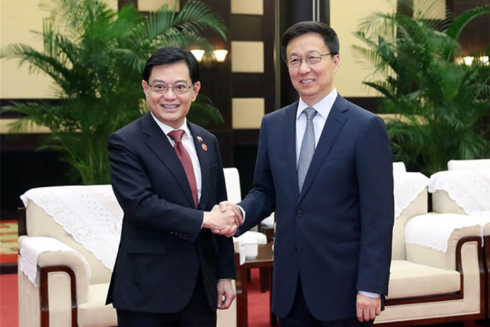 Heng Swee Keat(left) and Han Zheng in Chongqing in 2019. Photo: Xinhua