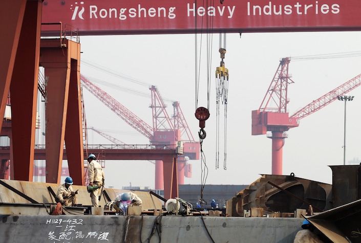 Workers at Jiangsu Rongsheng Heavy Industries on Nov. 4, 2010.