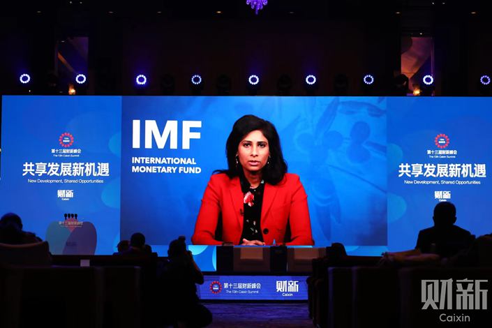IMF First Deputy Managing Director Gita Gopinath addresses an audience at the Caixin Summit in Beijing on Thursday. Photo: VCG