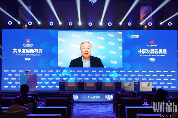 Zhou Xiaochuan, a former PBOC governor, speaks at the 13th Caixin Summit via video link on Thursday. Photo: Caixin
