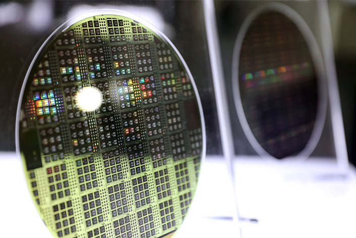 Silicon wafers sit on display at a Foxconn event in Taipei, Taiwan, on Oct. 18. Photo: Bloomberg