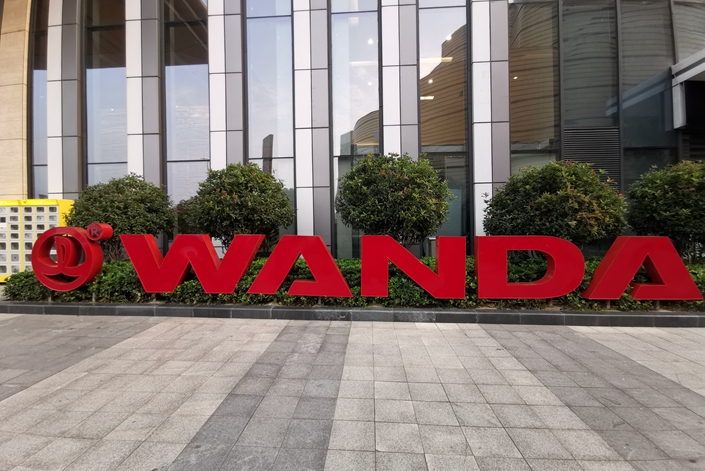Wanda Group, once one of China’s most high-profile developers, has been building an asset-light business model to reduce debt generated from buying land and building properties. Photo: VCG