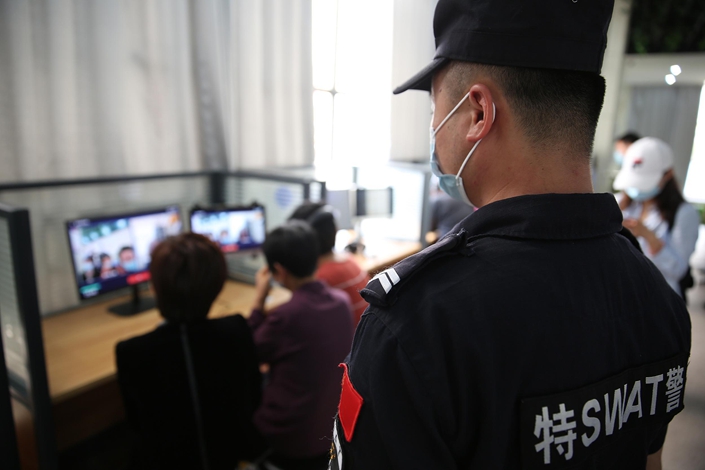 On Sept. 25, 2020, the meeting center of Baihu Prison Administration Branch in Hefei, Anhui Province, relatives and prisoners talked by video phone. Photo: VCG