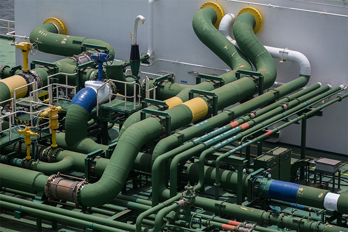 The pipes of the UMM BAB liquefied natural gas (LNG) tanker at PGP Consortium Ltd. LNG Terminal in Karachi, Pakistan, on Friday, June 24.Photo: Bloomberg