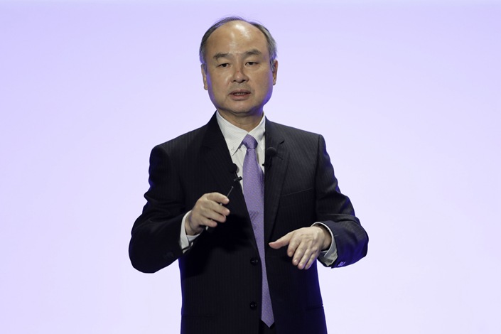 SoftBank shouldered big writedowns on investments in some of the world’s most high-flying startups, resulting in deep losses last year. Photo: Bloomberg
