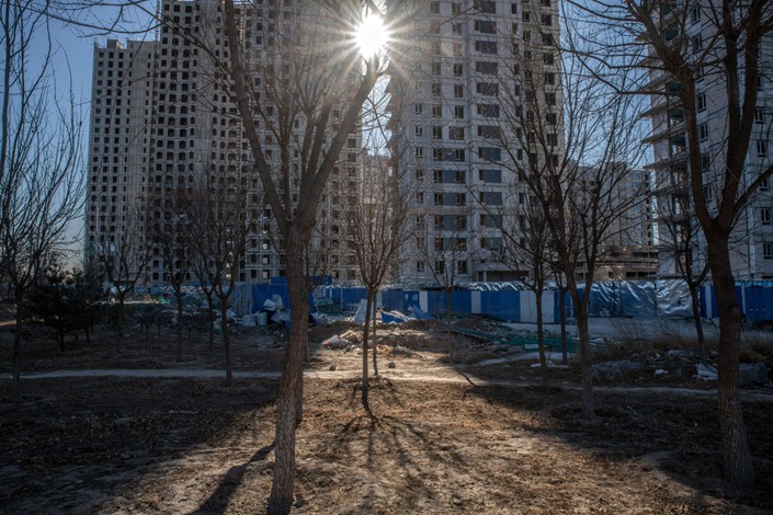 Residential buildings under construction in Beijing on Dec. 16. Source: Bloomberg