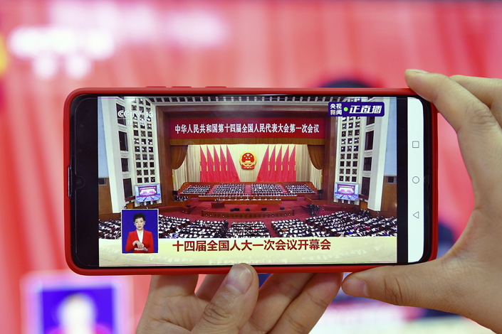 A screenshot from a live broadcast of the opening of the first session of China’s 14th National People’s Congress on Sunday. Photo: VCG