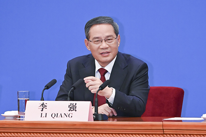 China’s new Premier Li Qiang meets the press at the Great Hall of the People in Beijing on Monday. Photo: Yue Yuewei/Xinhua