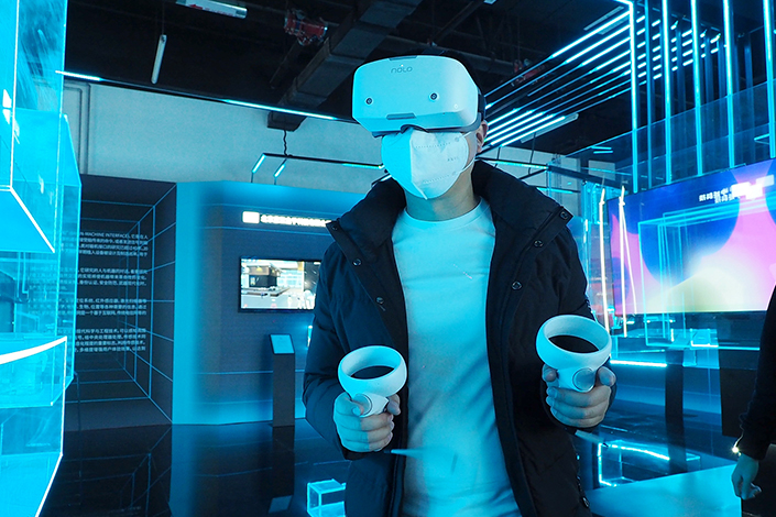 A man plays a virtual reality game at a metaverse concept exhibition in Beijing on Feb. 16. Photo: VCG
