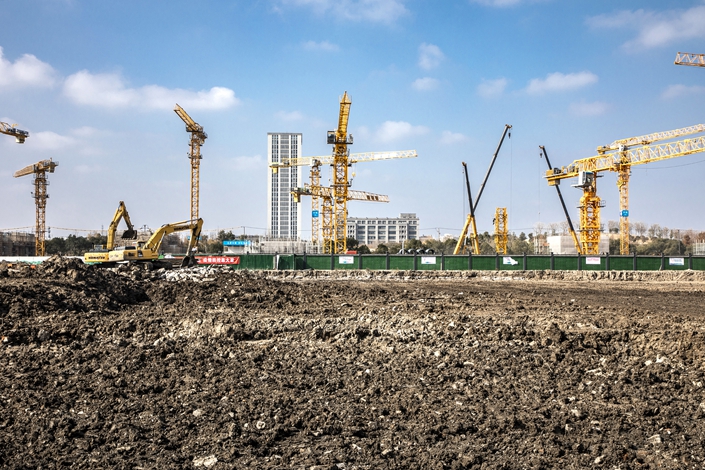 As the impact from Covid-19 tails off and economic recovery regains momentum, land sales revenue may rebound moderately in the next few years. Photo: VCG