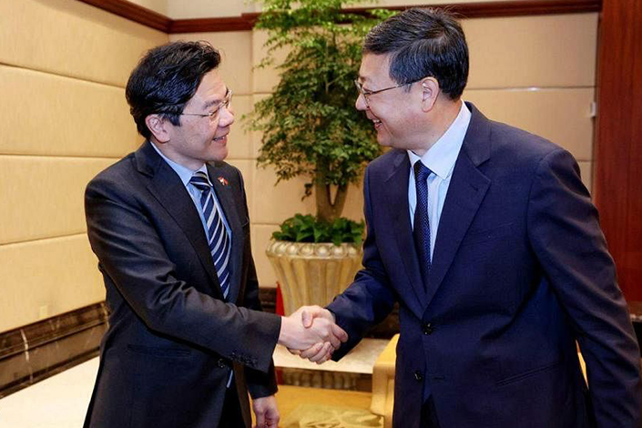Lawrence Wong (left) met Shanghai party chief Chen Jining for the first time since they were appointed to their respective positions. Photo: Ministry of Communications and Information of Singapore