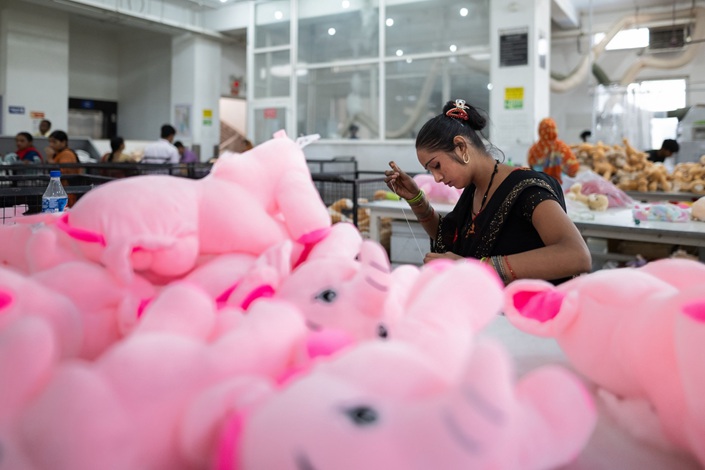 The more India tries to ramp up production in competition with China, the more dependent they become on their northern neighbor for components and raw materials.  Photo: Bloomberg