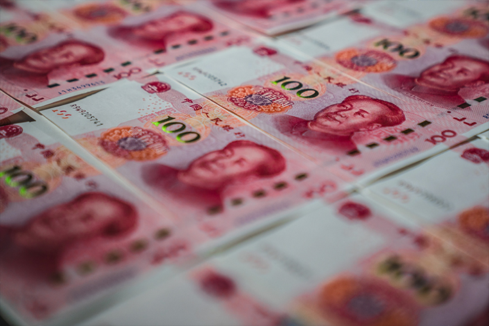 One of the reasons overseas investors have been wary about investing in Chinese debt has been the weakening yuan. Photo: Bloomberg