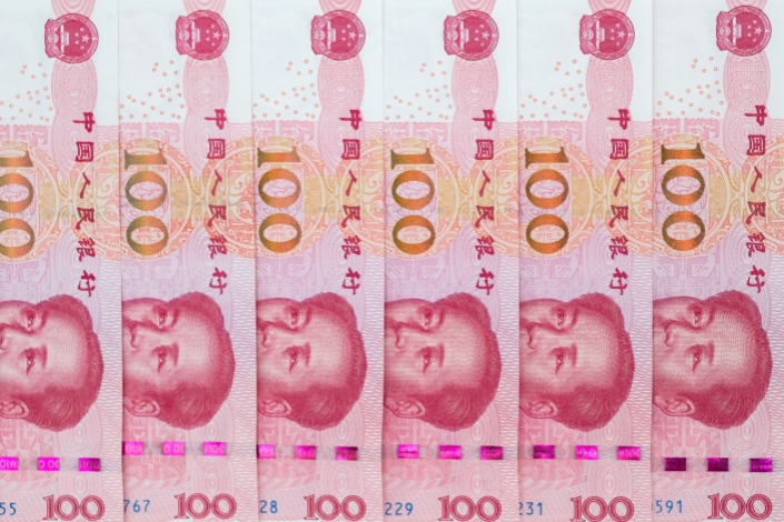 China’s currency tumbled toward its weakest level since 2007 against the dollar in August, after a surprise interest-rate cut failed to boost investor sentiment. Photo: Bloomberg