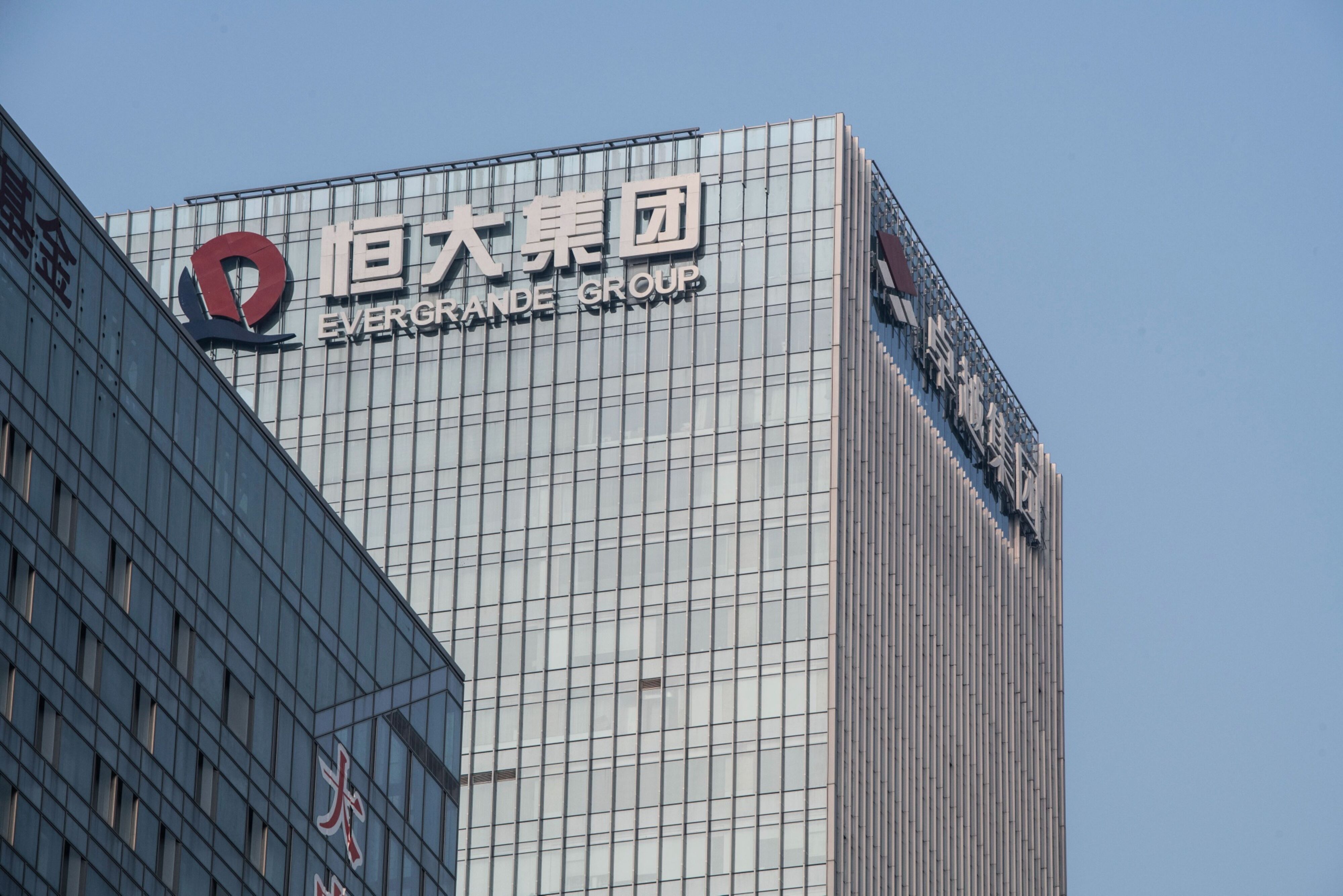 At the epicenter of China’s property crisis, Evergrande is under pressure to finalize a blueprint for its offshore debt restructuring as it grapples with an even bigger pile of total liabilities. Photo: Bloomberg