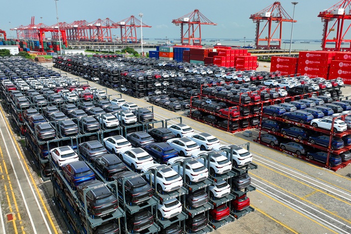 On Sept. 11, a batch of new-energy vehicles were about to be exported at the International Container Terminal in Taicang Port Area, Suzhou Port. Photo:VCG
