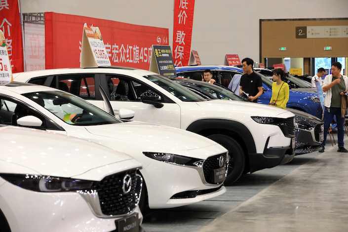 Car shoppers at an auto show in Huaian, Jiangsu province, on Sept. 23, 2023.