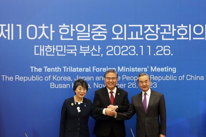 Foreign Minister Wang Yi attends the 10th trilateral foreign ministers meeting Sunday in Busan, South Korea, with his counterparts: South Korean Foreign Minister Park Jin and Japanese Foreign Minister Yoko Kamikawa. Photo: China’s Ministry of Foreign Affairs