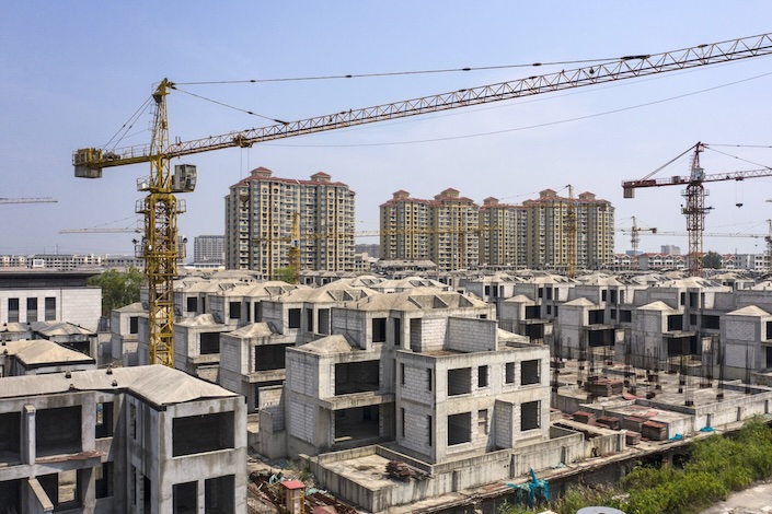 The value of new home sales from the 100 biggest real estate companies slid 60% from a year earlier to 185.9 billion yuan in February