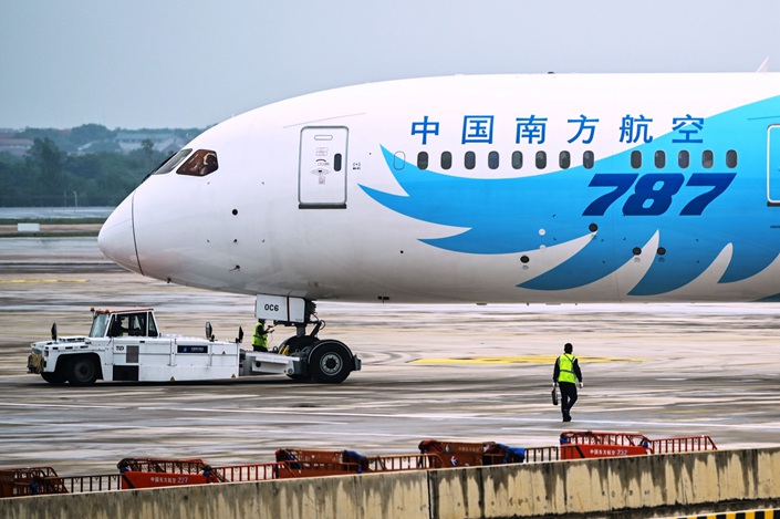 A Boeing 787 gets towed at an airport in Wuhan, Central China’s Hubei province, in May 2020. Photo: Bloomberg