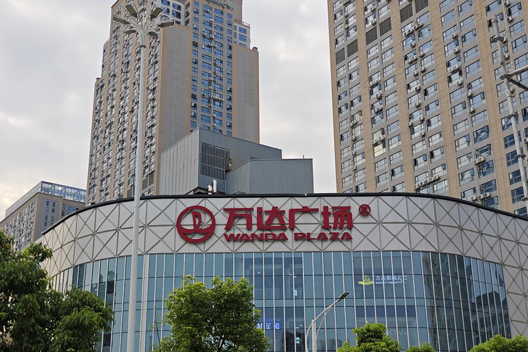 A subsidiary of Dalian Wanda Group sold four of its flagship shopping malls last week as the conglomerate’s liquidity crisis deepens. Photo: VCG