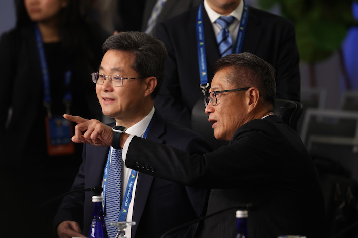 Lan Foan, China's finance minister, left, and Paul Chan, Hong Kong's financial secretary, at the Asia-Pacific Economic Cooperation (APEC) Finance Ministers Meeting in San Francisco on Nov. 13, 2023.