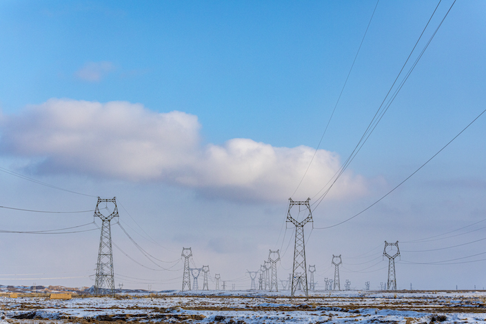 Ultra-high voltage power lines in Jinchang, Gansu, on Dec. 26, 2021.