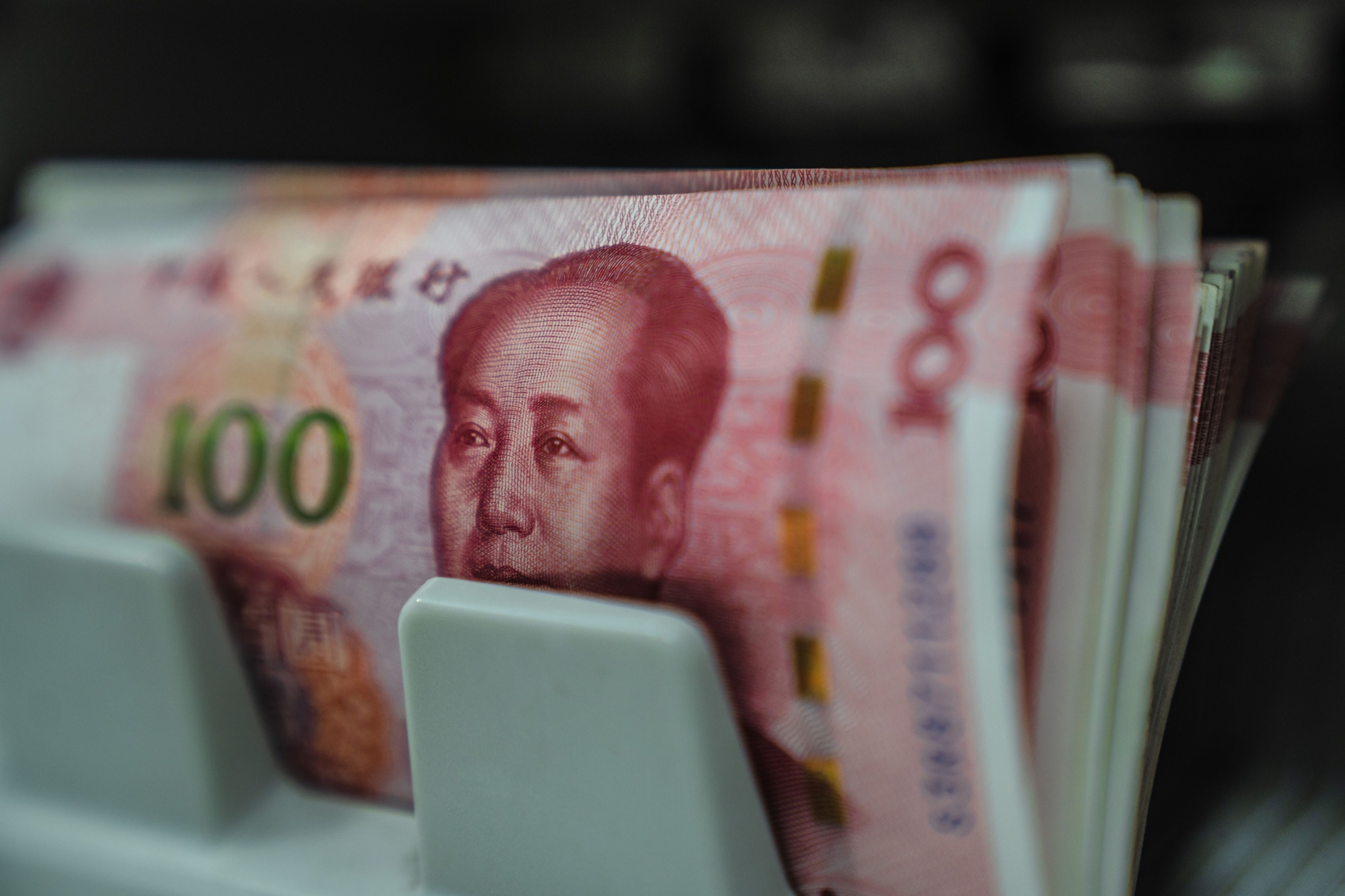 Chinese banks’ overseas units have been limiting their offers of yuan in Hong Kong recently, as the currency hit the weakest since November. Photo: Bloomberg
