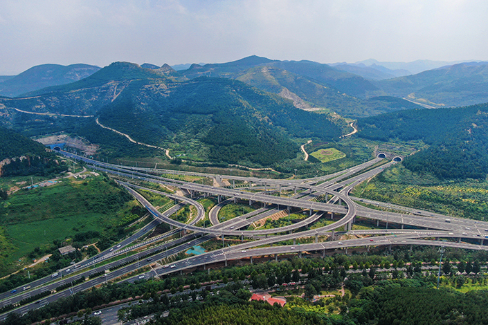 Cars drive through an interchange in Jinan, Shandong province, in August 2021. Photo: VCG