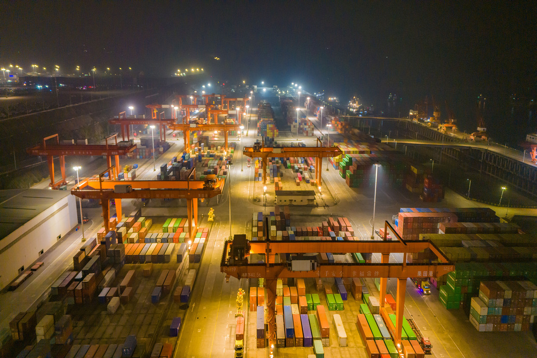 Chongqing’s Guoyuan Port bustles with activity throughout Thursday night. Photo: VCG